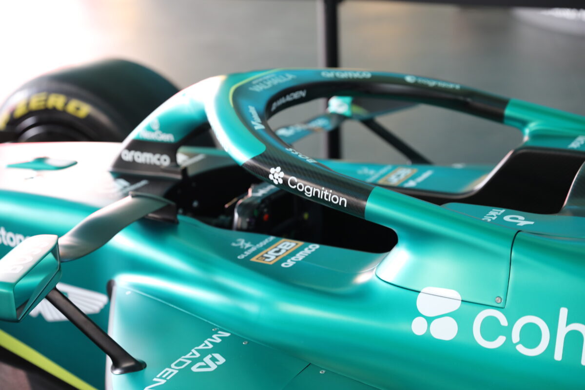 Aston Martin Aramco F1 car in teal and black livery, shown close up at the Silverstone celebration event